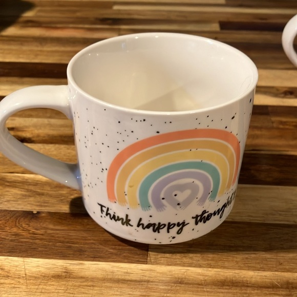 Set of 4 Coco and Lola coffee mugs in wire rack. - Picture 3 of 8